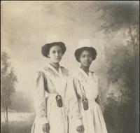Front and back of a postcard with two nurses