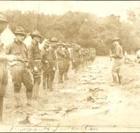 Postcard - Men in military uniforms